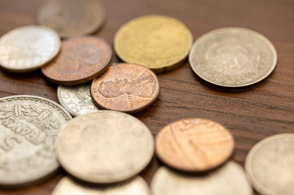 Moedas.